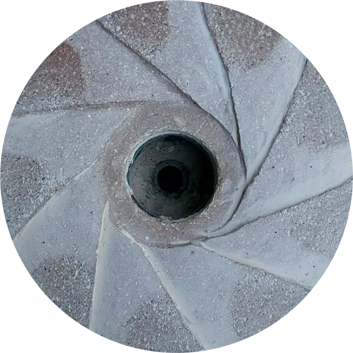 Our chakki stone seen from above, with curved grooves cut into its face